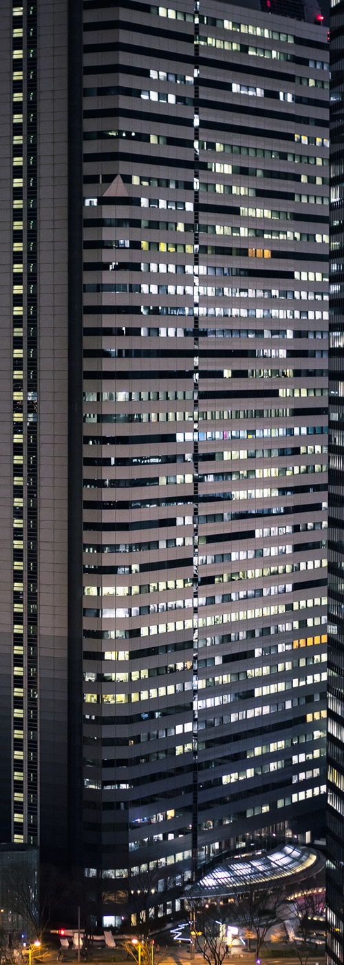 Shinjuku-ku, Tokyo, Japan - Feb 22, 2013: Taken in Nishi-Shinjuku, Shinjuku-ward, Tokyo. Shinjuku is a major commercial center in Tokyo. Shinjuku has two different faces?kyscrapers and office buildings are located in the west and the red light district known as Kabukicho is located in the east.